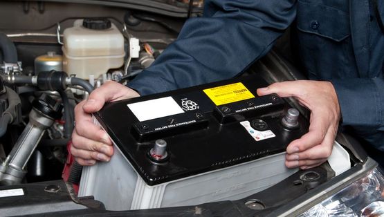 An Image of a Car Undergoing battery change 